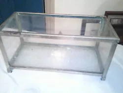 OLD SMALL AQUARIUM LOOK MAYBE PLANTER OR MAYBE A  AQUARIUM.MEASURES 14 INCHES LONG 6 INCHES WIDE 7 INCHES TALL.HAS 4...