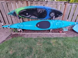 Necky Kyook 16 Touring Kayak.  No cracks or leaks, working skeg. Comes with paddles.