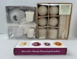 3 Pansy Floating Candles. 15 Assorted White Candles. 3 Candle Gift Sets. 2 White Votives with Glass Holder and Top.