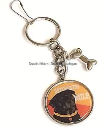 Sweet Rottweiler with a heart on his collar. Whimsical dog bone charm included. Can also be used as a purse, diaper bag.