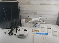 DJI phantom 4k W325 Three batteries Owners manual Two sets of propellors 4 additional silver blades and 1 additional...