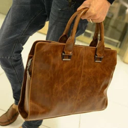 This work bag takes it all in stride with classic style and functionality around every curve. The interior is fully...