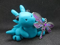 This dragon has such a pretty dragonfly. They are made for mature children to adults. They are semi fragile and are to...