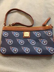 Dooney and Bourke NFL Tennessee Titans Large Wristlet Wallet. Purchased at Nissan stadium and carried once. Perfect...