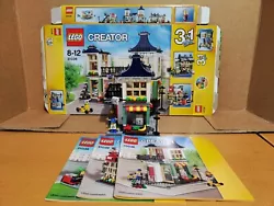 Lego 31036 Creator - Toy & Grocery Shop [Occasion] très bon état Constructions + minifigs + livrets dinstructions +...
