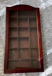 Shown in last picture. There are two holes in back.