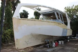 An unfinished boat with engines (in the garage - 2 diesel engines of 256 horsepower each 650 hours of operation, with a...