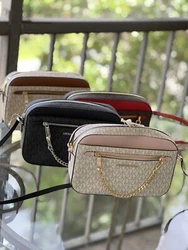 Old Version of EW Crossbody has No Exterior Slip Pockets in Front or Back of Crossbody bag. Large EW Zip Chain Xbody or...