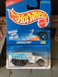 1996 Hot Wheels #492 Swingfire snow patrol white. Please see pictures for overall condition. I combine shipping.