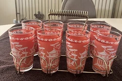Beautiful set of 8 glasses with holder. Vibrant coral color. Pristine condition. No chips or cracks. Hazel Atlas made...