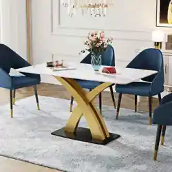 Kitchen Dining Table. The base of the dining table is made of stainless steel in a glazed gold finish and carbon steel....