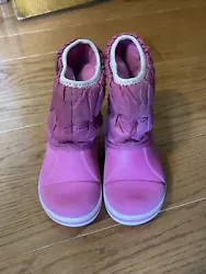 CROCS Rain Or Snow Boots Size C 9 PINK Item # 14613. Shoes has some discoloration and could use as good cleaning but...