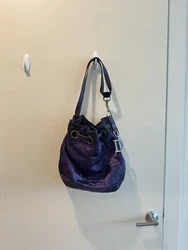 This stunning Dior tote bag is a must-have for any fashion-forward woman. Its luxurious silk exterior in gorgeous...