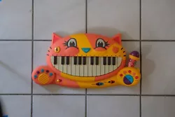 My B.Toys Meowsic Singing Orange Cat Piano Keyboard w/ Microphone Music Toy.