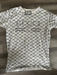 Gucci Shirt Medium. Show signs of wear but still have LOTS of life n it real authentic by the way