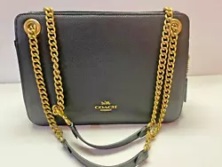 Coach Black Leather Purse - Gold chain Handle. Suede bottom and up along the sides (the narrow sides).