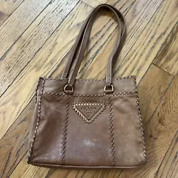 This is a great vintage bag from designer Prada. Brown leather with gold hardware. Some fading in spots, which I tried...