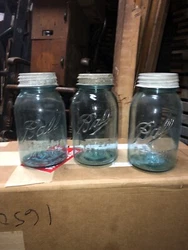 Early 20th century Ball Mason jars.