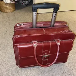 Franklin Covey Rolling Leather Briefcase Carry Travel Bag Laptop Burgundy. Condition is Pre-owned. Shipped with USPS...