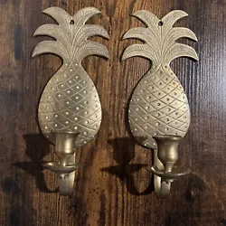 Add a touch of tropical glam to your home decor with this vintage brass pineapple wall sconce candle holder set. The...