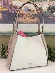 Kate Spade New York. Gorgeous Pebbled Leather in Light Sand. Purse Features Dual leather Handles with 10