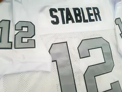 Oakland Raiders #12 Ken Stabler Classic version Jersey. Everything is sewn on! Color is White/Silver.