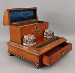Th century, English Victorian Oak Desk Set. There is a pen rest and two pressed glass inkwells. The inkwells are...