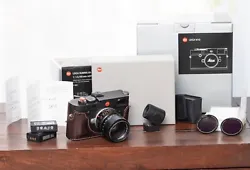 This is a classic Leica starter kit. The addition of a thumbs up grip enhances stability, and a Visoflex Type 020...