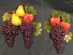 We have a set of two resin, hand crafted and hand painted wall plaques. They both feature fruits; apples, pears and...