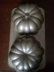 Nordic Ware - The Great Pumpkin Pan. Worn a bit on top from use. No dents, cracks or warps. Solid pan still amazing to...