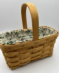Longaberger hand woven Basket.  Made in USA.  Liner is in excellent condition.  Clear Plastic Liner is excellent...