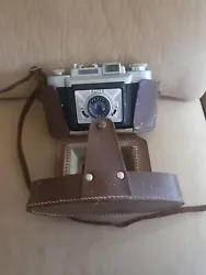 Ancien appareil photos élite fex en l’état avec Son Étui + Le Flash Et Son Etui. Usures d usage Lanière en cuir...