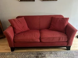This beautiful red Pottery Barn Cardinal love seat is a perfect addition to your home. Its two-cushion design provides...