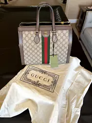 Used box and Gucci bag. Authentication code for the item: F037412485. Reason for selling is gifted item and rather...