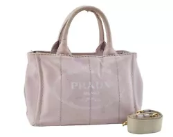Material Canvas. Pocket Inside Pocket has dingy,dirt,rubbed. Color Pink. Style Hand bag. Accessory Shoulder strap....
