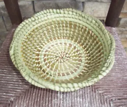This is a Charleston Sweetgrass Fanner Basket that is used for bread, rolls, pastry, and wedding decor. These are...