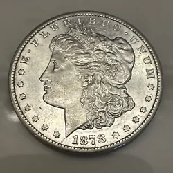 This 1878-CC Morgan Silver Dollar is a fantastic addition to any collection. Minted in Carson City, United States, this...