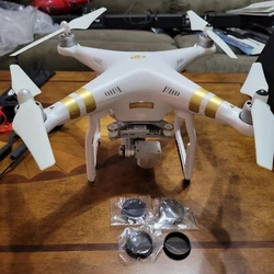 DJI Phantom 3 Professional Drone - White Model w325. Comes with extra propeller blades, 2 batteries, extra gimbles,...