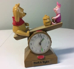 Vtg Disney Winnie The Pooh & Pigley See Saw Animated Musical Alarm Clock. Clock tested and works . Will need 4C...