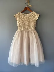 Nearly new condition.girls size 12 Easter flower girls party dress ivory rose gold. Worn once as a flower girls dressNo...