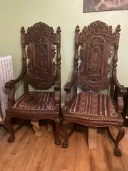Gorgeous pair of RJ Horner dining room arm chairs CA 1900-1910. Carved from quarter sawn oak, the chairs feature...