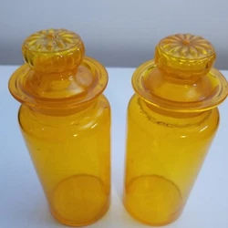 Includes 2 jars. Measures ~ 7 tall. 8