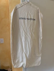Louis Vuitton garment bag never used, hanger included