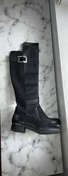 Experience the ultimate fashion statement with these stunning Calvin Klein Over The Knee Boots. Crafted with...