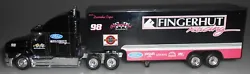 This is a Matchbox Fingerhut Racing Ford Aeromax with Low Bed Trailer rubber tires. It is in excellent condition...