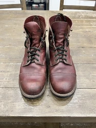 Introducing the Red Wing Shoes Mens oxblood Iron Ranger boots feature a  a tie closure for a stylish yet secure fit....