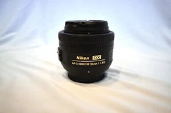Used Nikon DX AF-S NIKKOR 35mm 1:1.8G   F mount lens/DX format. Picture angle with Nikon DX format 44 degree 52.5...