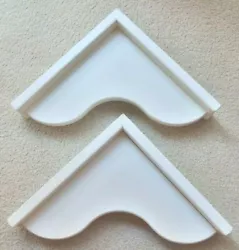 Set of 2 Wood Slightly Off-White Corner Shelves with curved shelf. Condition is new, never used. One shelf with the...
