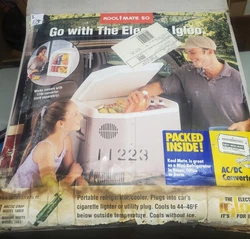 Igloo Kool Mate 50 Portable Electric Cooler Mini Fridge Includes AC/DC Converter. The bottom of the box is in rough...