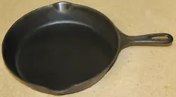 Here is a very nice Griswold cast iron skillet #8 in very good condition. The pan sits flat and is free of any damage....